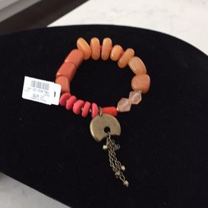 Chico’s orange bracelet